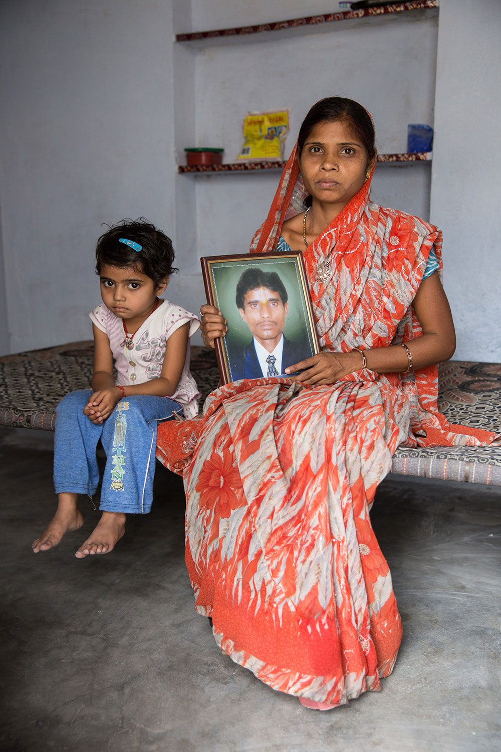 Sunita Devi Gupta, 30, with Saniya, one of her three children. She lost her husband to alcoholism in 2012. She works in the Opus III women's project.