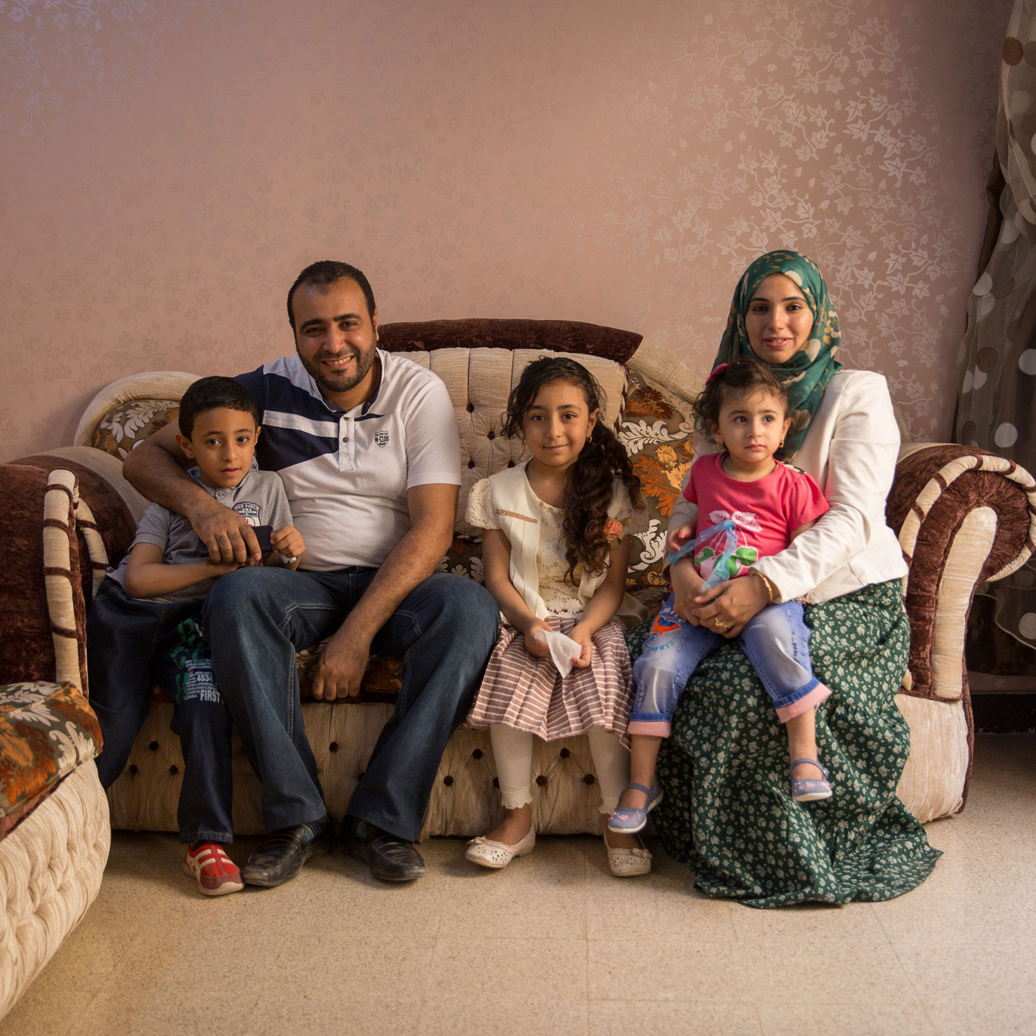  Heba and her husband Amr live in Al Quseya together with their three children.  Amr shares “I wanted to study engineering but I couldn’t, so I fully support her career. Her success is our success as she is an extension of myself.”   Photo for USAID/Egypt.  